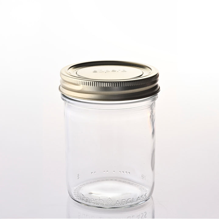 Regular mouth canning jar set on kitchen counter Regular mouth canning jar with airtight lid High-quality canning jars for food storage