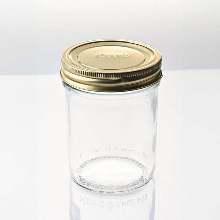 Regular mouth canning jar set on kitchen counter Regular mouth canning jar with airtight lid High-quality canning jars for food storage