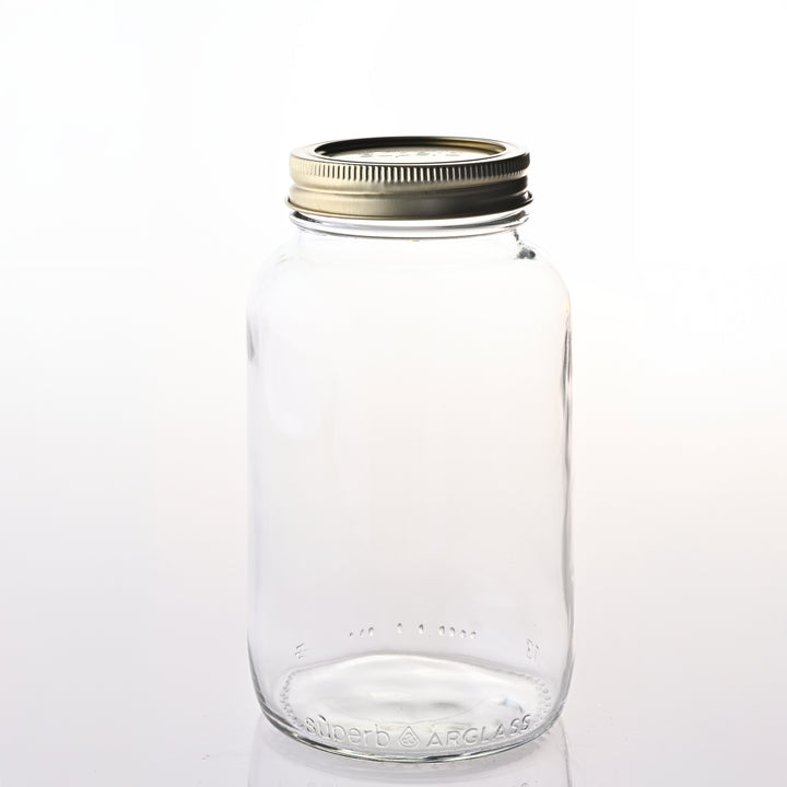 Regular mouth canning jar set on kitchen counter Regular mouth canning jar with airtight lid High-quality canning jars for food storage